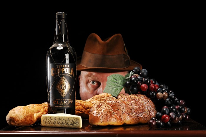 Francis Ford Coppola wine bottle with man and food