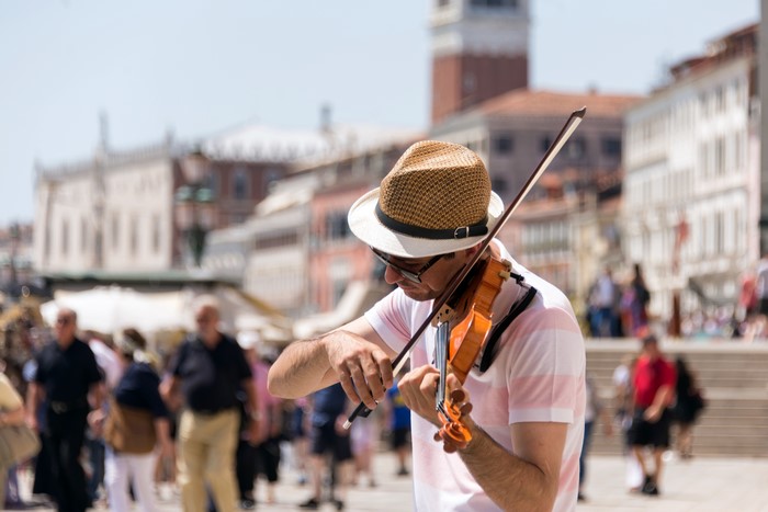 Man playing violin in Venice