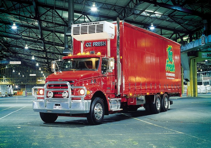 Red Sterling LT7500 refrigerated truck with Oz Fresh strawberries logo