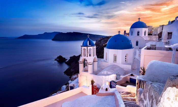 Oia, Santorini, Greece - Blue Domes and Sea at Sunset