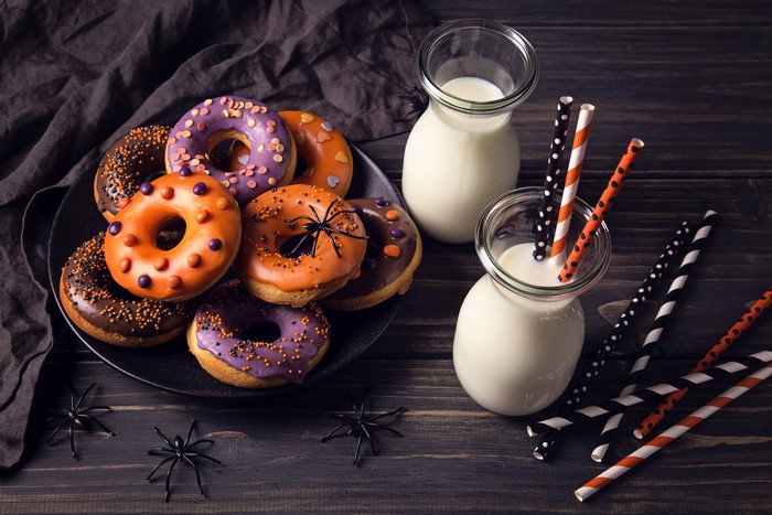 Halloween donuts and milk with straws