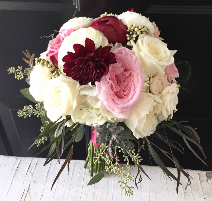 Wedding bouquet with roses and dahlias