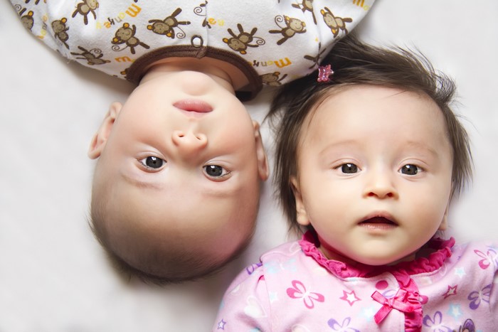 Two infants looking up