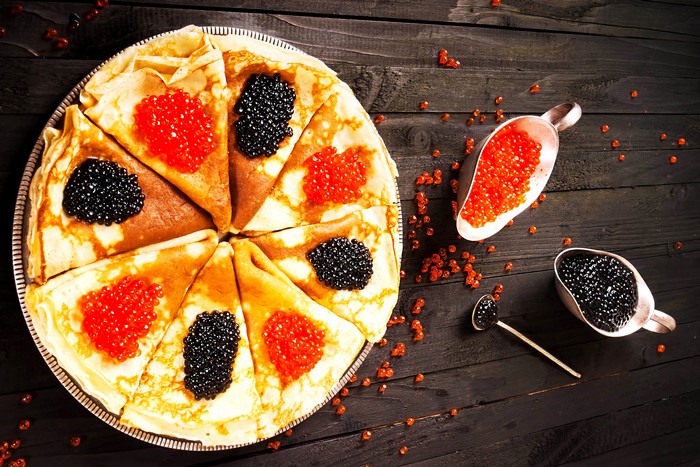 Pancakes with red and black caviar