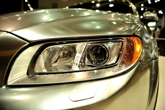 Closeup of a silver car headlight