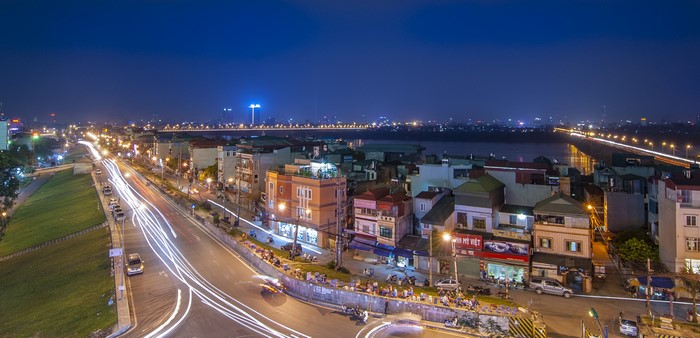 Hanoi, Vietnam at Night with Light Trails on Road
