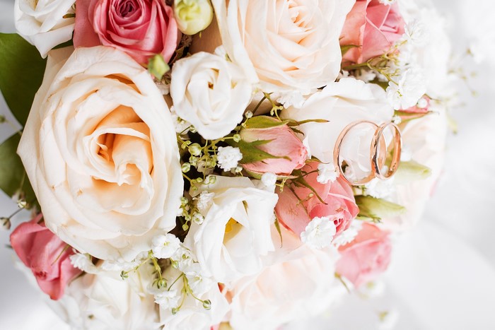 Wedding Rings on a Rose Bouquet