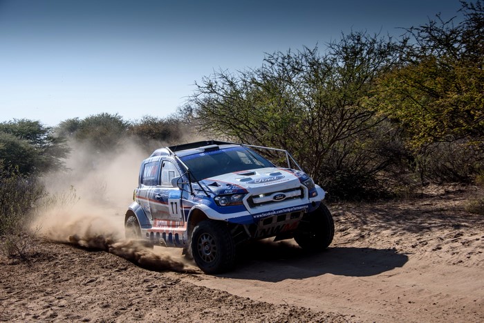 Ford Ranger Dakar race car kicking up dust