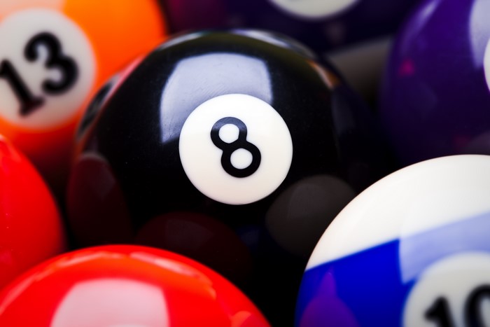 Closeup of Billiard Balls with 8 Ball in Focus