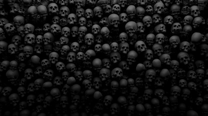 A dense wall of dark, monochrome skulls.