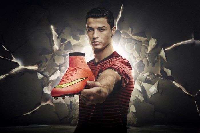 Cristiano Ronaldo holding Nike soccer cleat