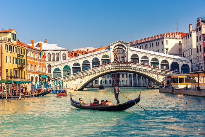 Rialto Bridge and Gondola on Grand Canal, Venice, Italy