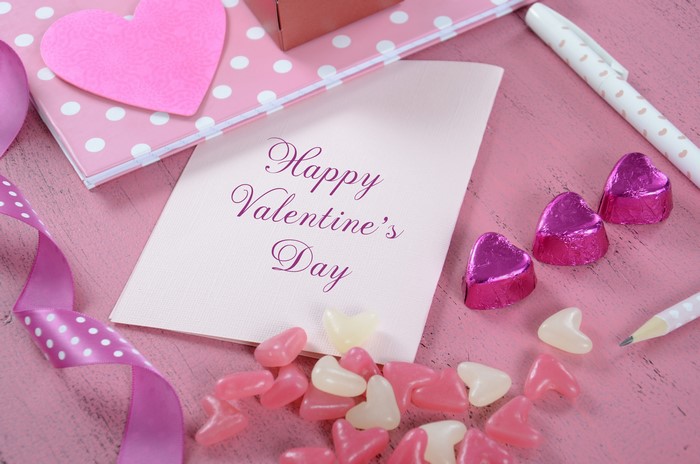 Valentine's Day card with chocolates and ribbon