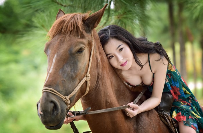 4K Close-up of Woman Hugging Horse Outdoors