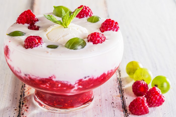 Ice cream with raspberries and gooseberries