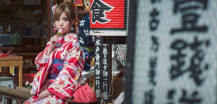 Woman in Kimono Eating Dango
