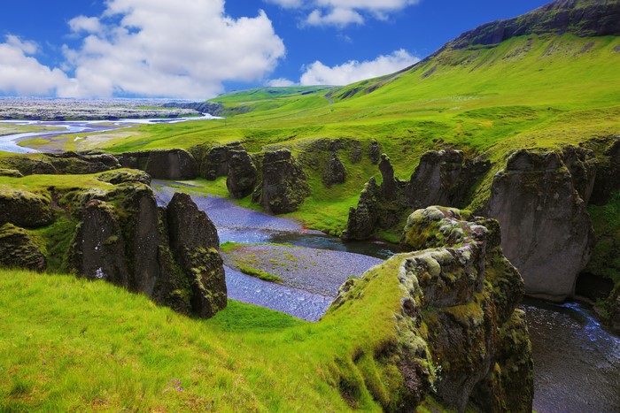 Fjadrargljufur Canyon in Iceland with River and Clouds