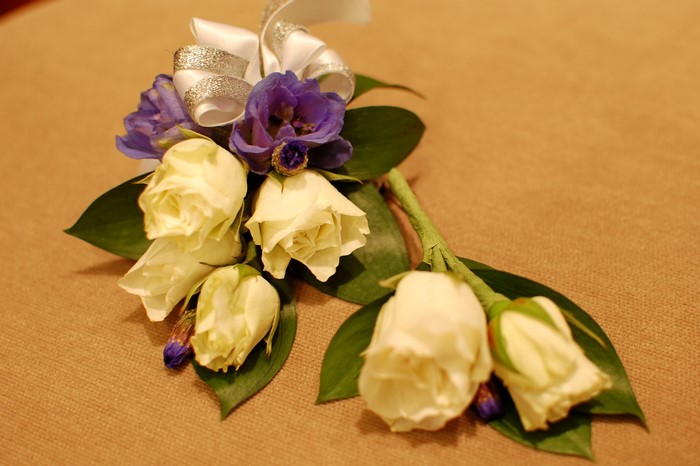 White roses and purple eustoma with ribbon