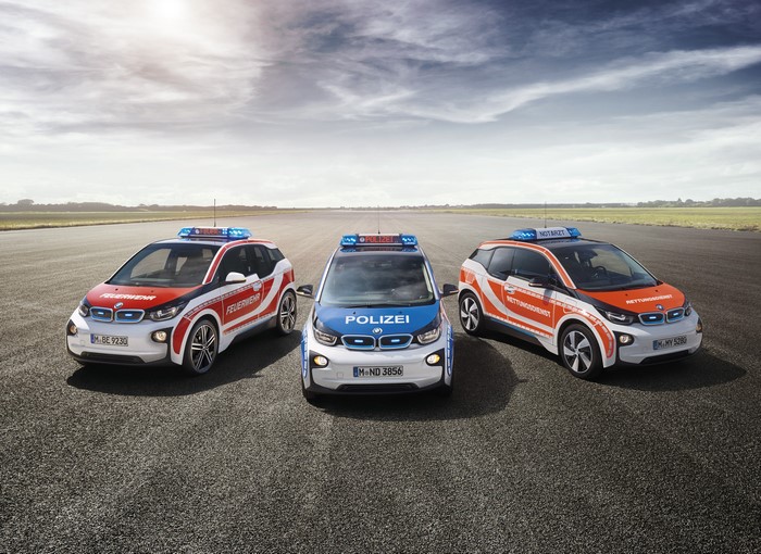 Three BMW i3 emergency vehicles on asphalt