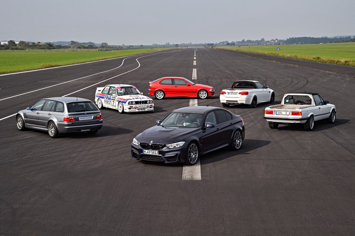 BMW M3 Generations on a Racetrack