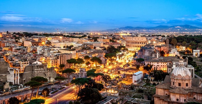 Rome cityscape with Colosseum at dusk