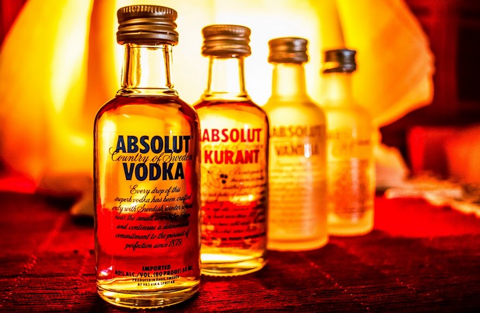 Absolut Vodka bottles on a table