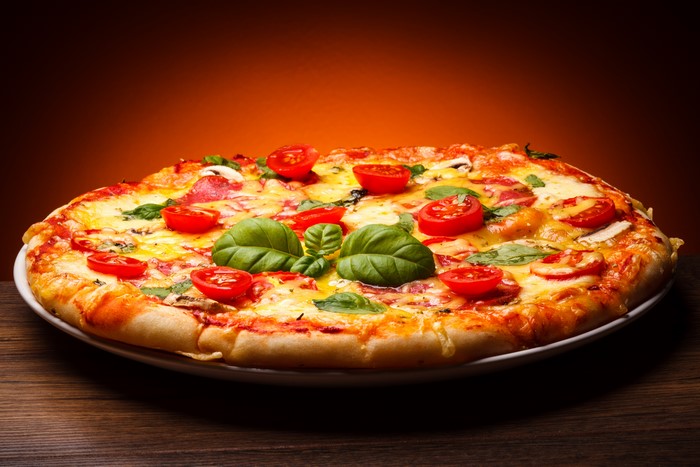 Delicious 4K Closeup of Fresh Basil Pizza