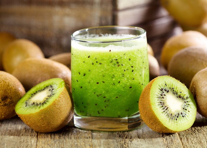 Kiwi Juice in Highball Glass with Kiwis