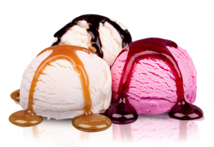 Three scoops of ice cream with toppings