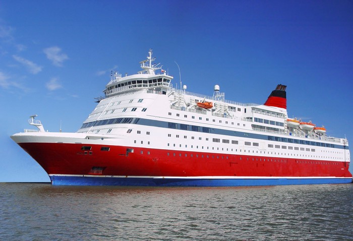 Red and white cruise liner on the sea