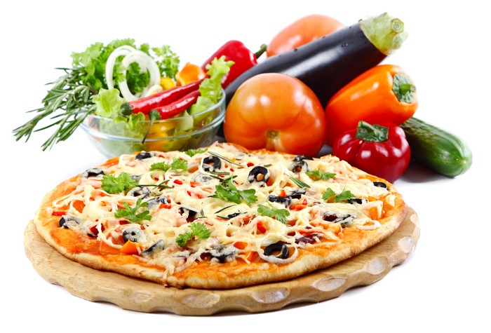 Pizza with fresh vegetables and salad