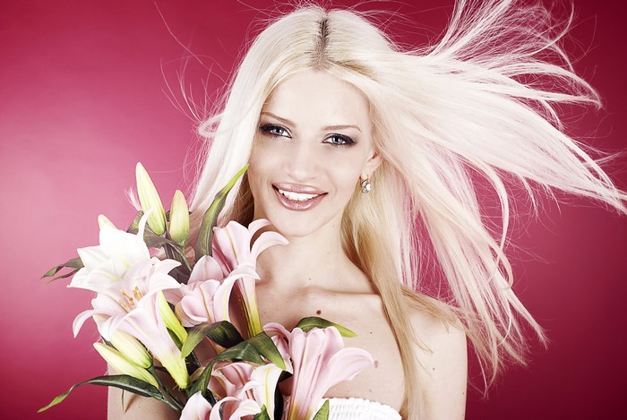 Blonde girl with lilies