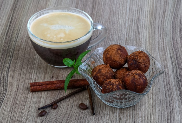 Coffee with chocolate truffles and cinnamon