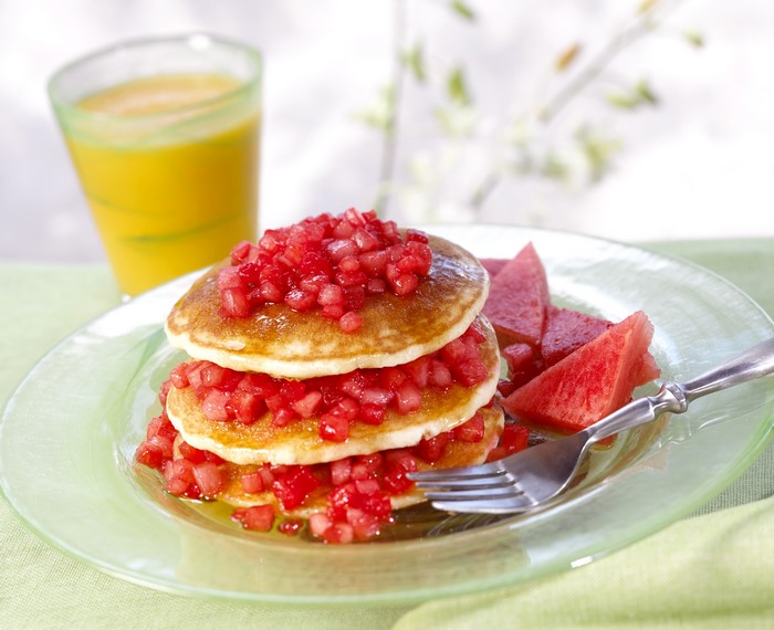 Pancakes with watermelon and orange juice