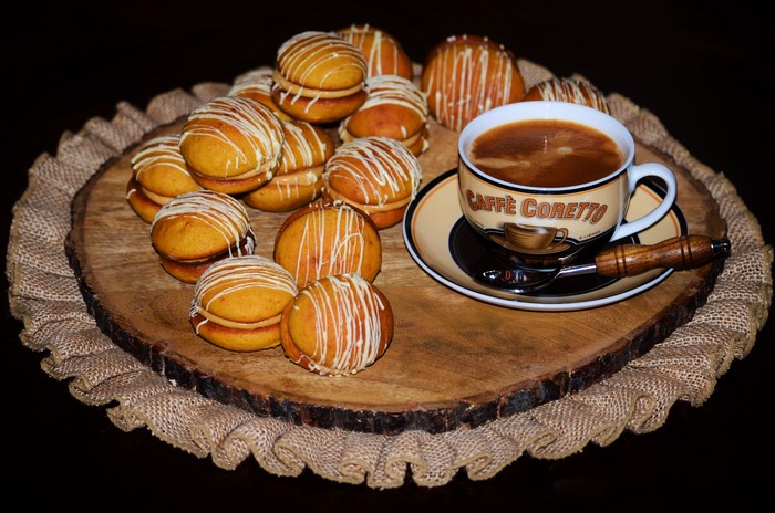 Coffee and Cookies on a Wooden Board