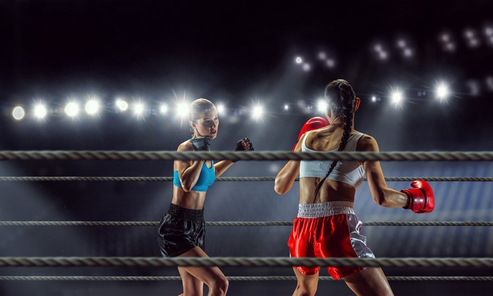 Two female boxers in a ring