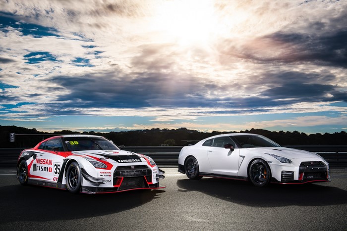 Two Nissan GT-R cars, one racing, one white