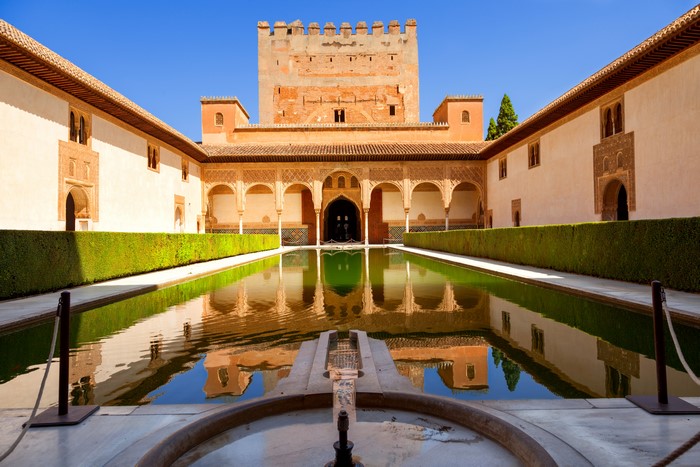 Alhambra Palace courtyard with reflecting pool and tower