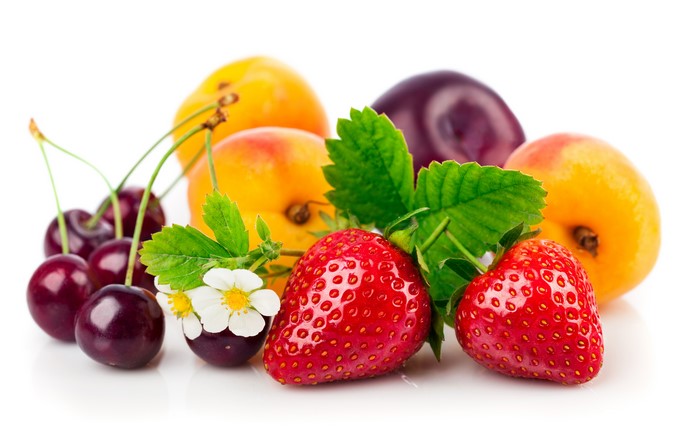 Strawberries, Cherries, Plums, and Apricots on White Background