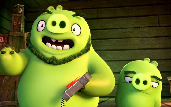 Two pigs from Angry Birds holding a device