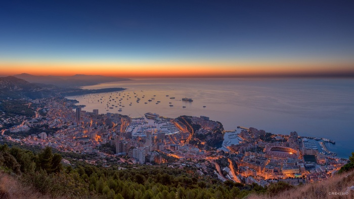 Panoramic view of Monaco coastline at sunset