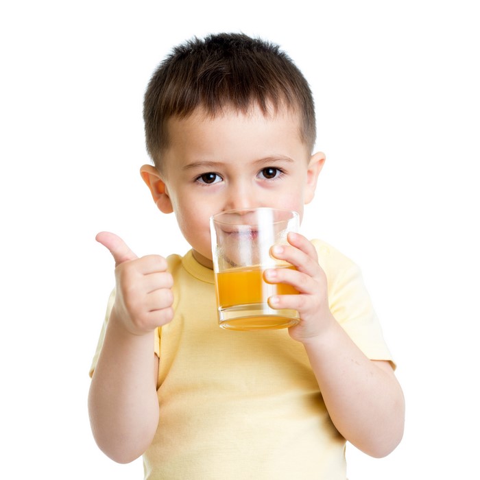 4K Image of Boy Drinking Orange Juice