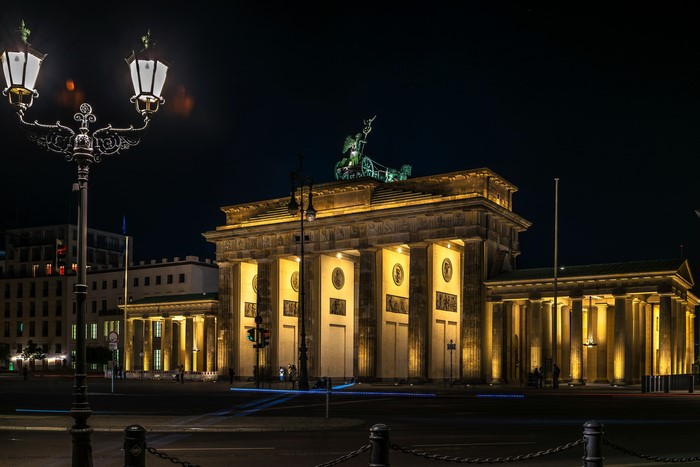 Brandenburger Tor at night with street lights, Germany