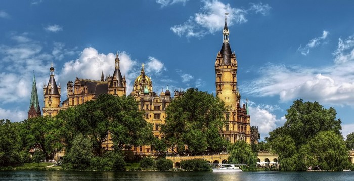 Schwerin Castle Germany with lake and trees
