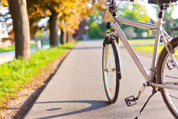 Bicycle on a path with trees