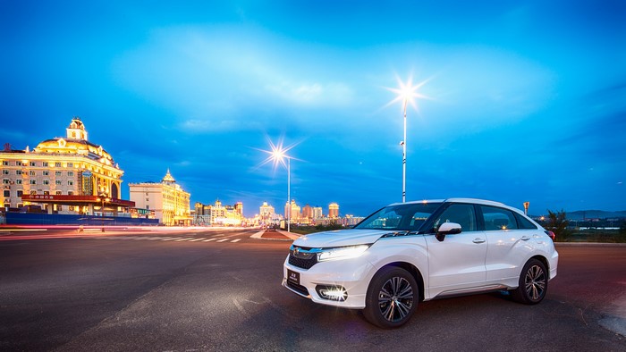 White 2016 Honda Avancier parked at night