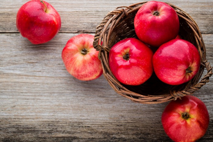 Red Apples in a Wicker Basket