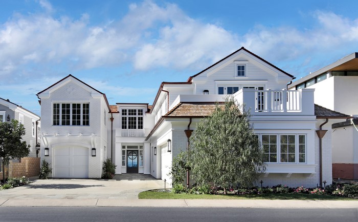 Modern White Brick Mansion with Garage and Balcony