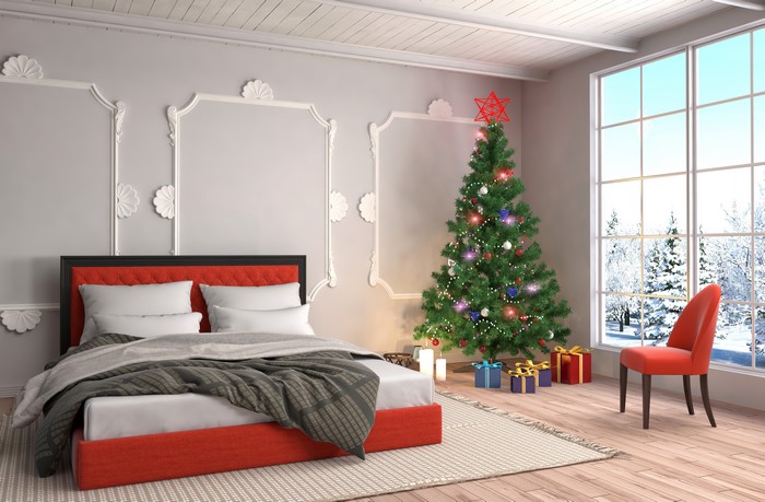 Christmas Bedroom Interior with Tree and Gifts