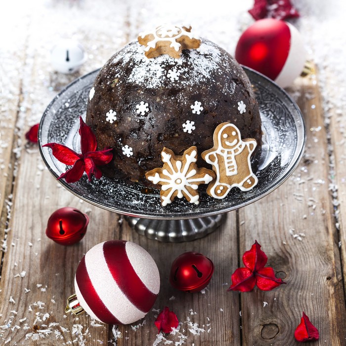 Christmas pudding with gingerbread cookies and ornaments